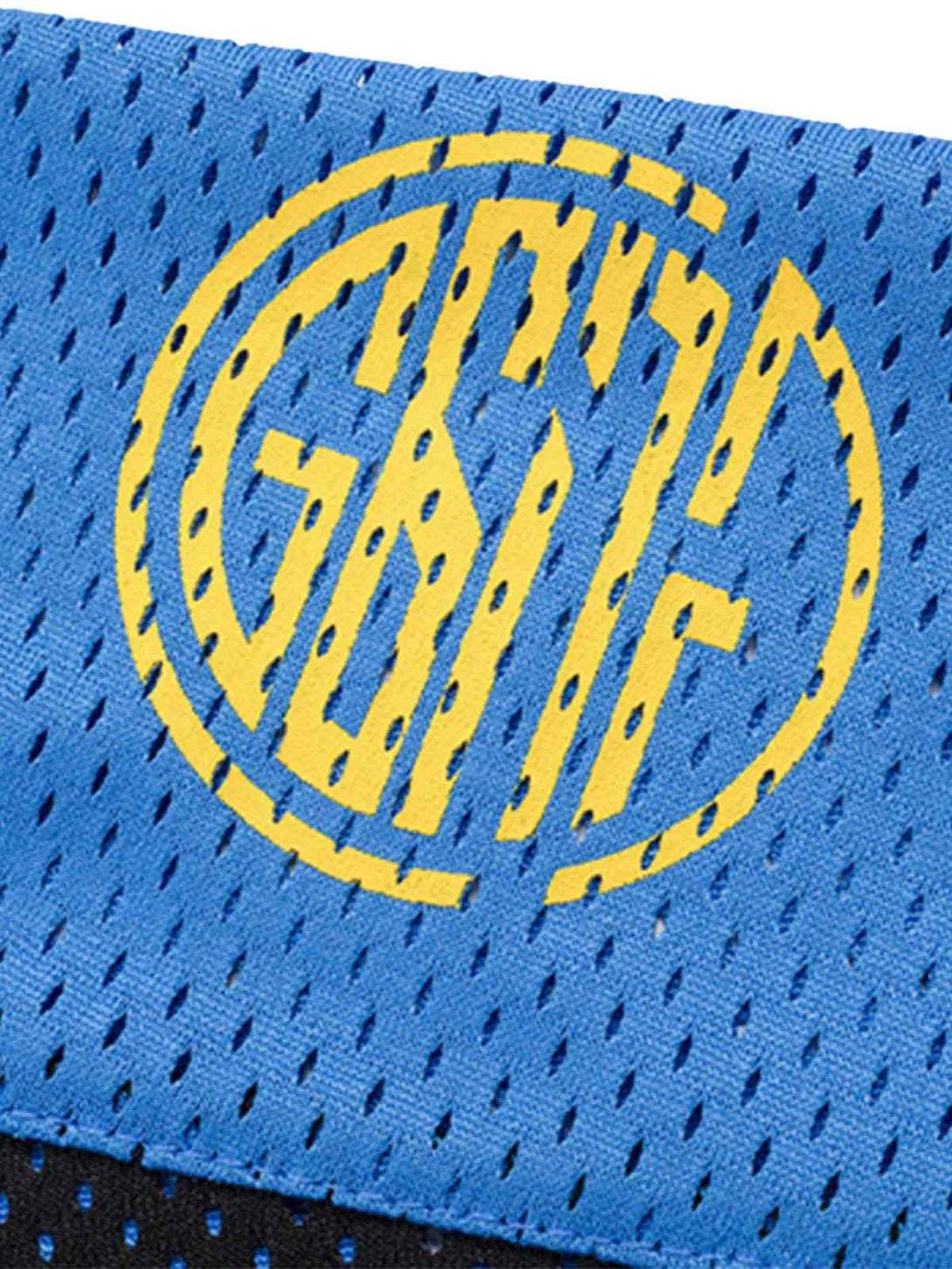 A tight crop highlighting the TALISHKO logo on a blue quick-dry jersey fabric.