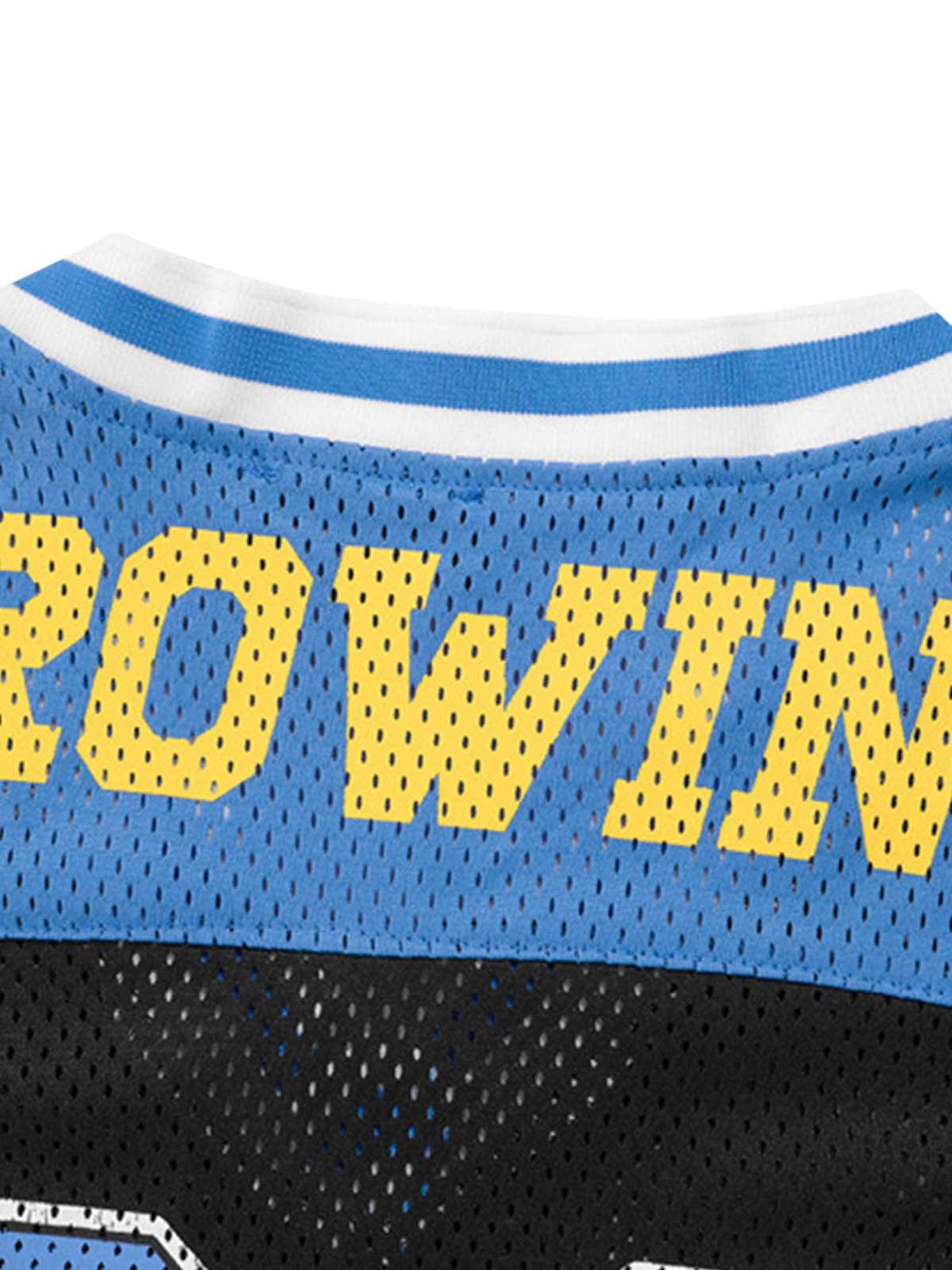 "A detailed view of TALISHKO's mesh fabric with bold yellow text on a blue quick-dry jersey."