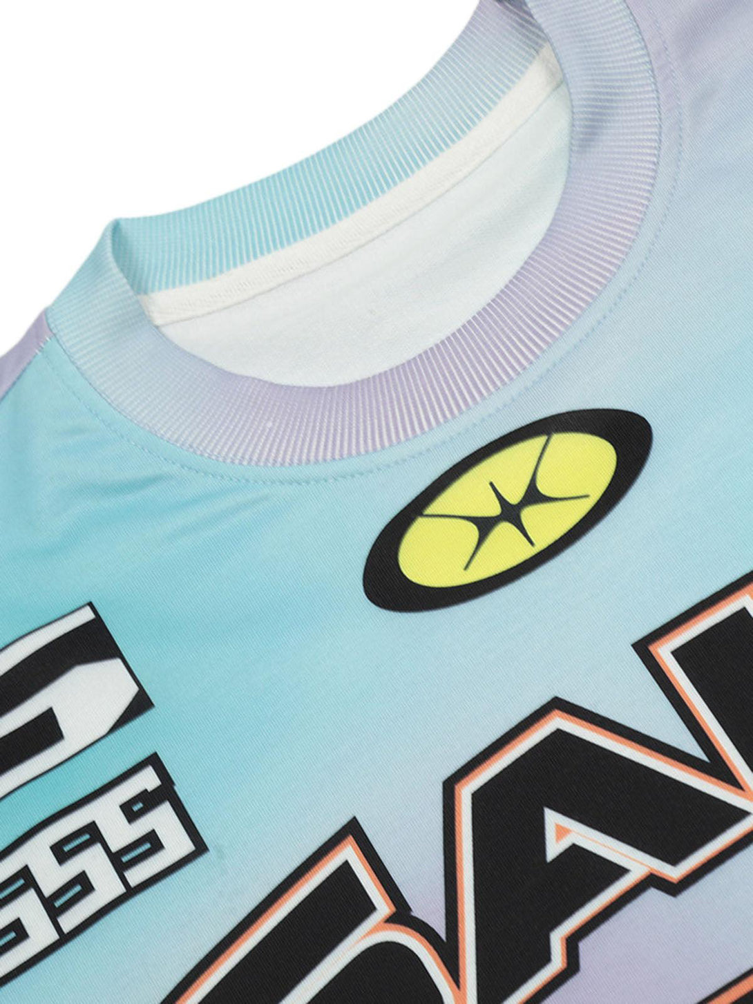 Detailed view of TALISHKO's tie-dye jersey T-shirt, showcasing vibrant graphics and colors.
