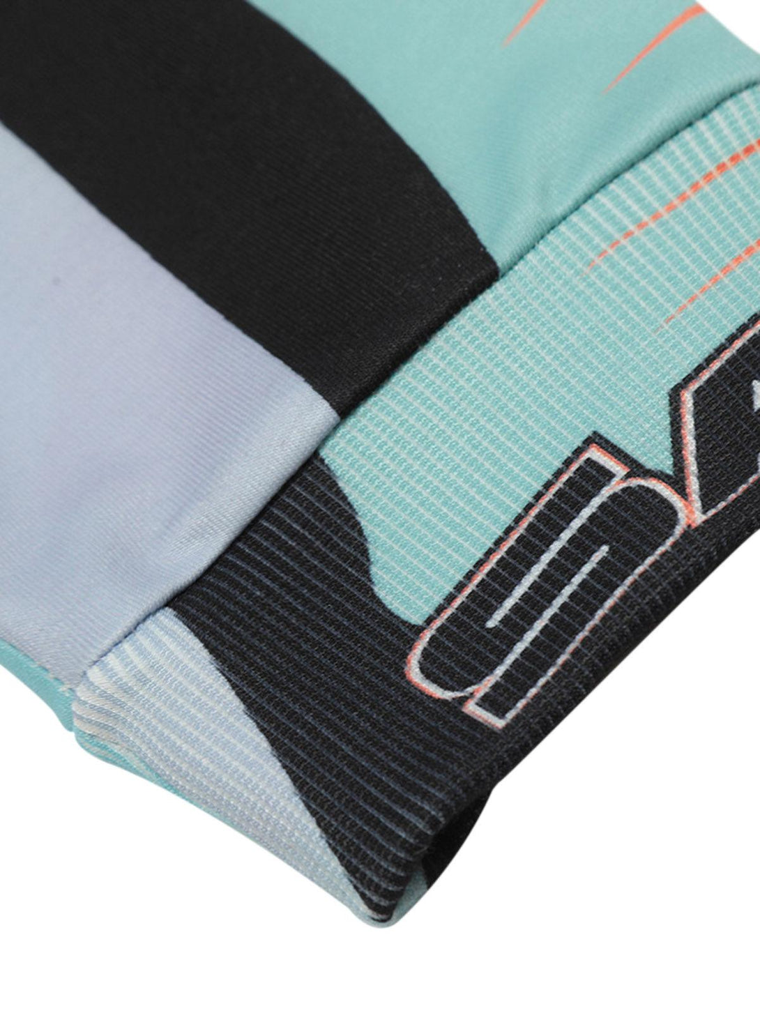 Texture and pattern showcased on TALISHKO's tie-dye long-sleeve jersey, featuring bold graphics.