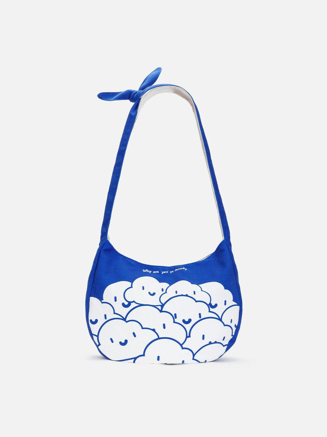 Cartoon-patterned canvas bag by TALISHKO in Klein blue, featuring a whimsical cloud design.