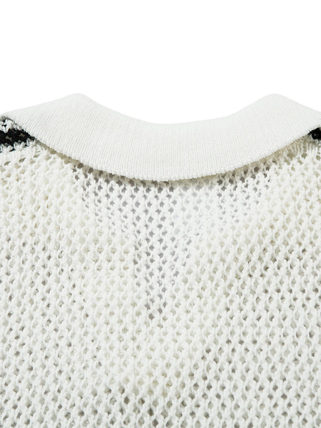 A detailed look at TALISHKO's knitted polo sweater, focusing on the textured back design.
