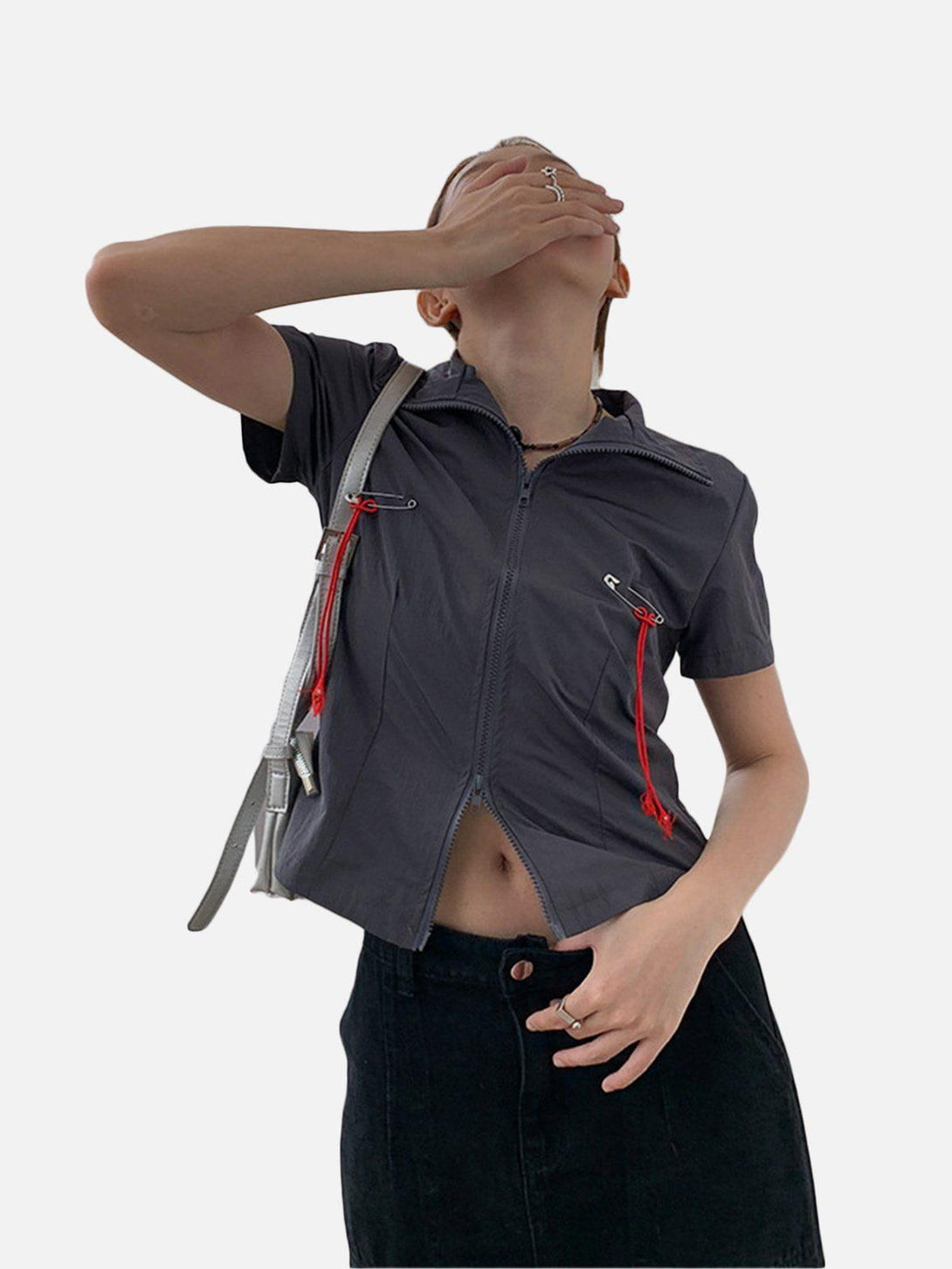Model wearing a gray TALISHKO Lanyard Zipper Tee with red drawstring accents, showcasing a stylish summer look.