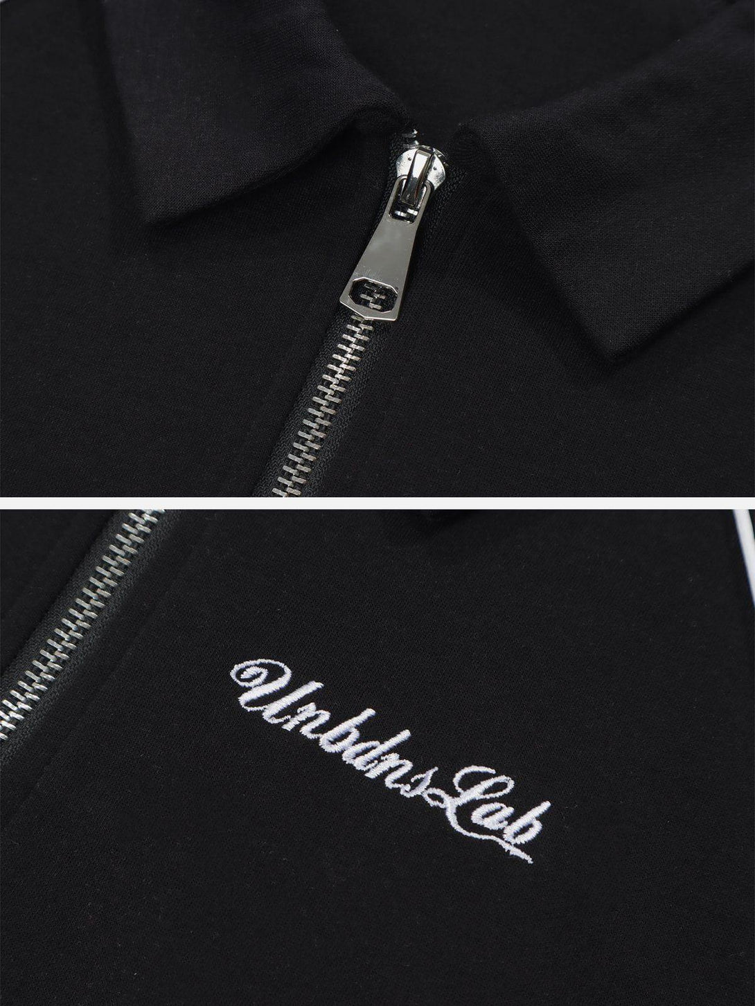 A close-up of TALISHKO lapel zipper tee, highlighting sleek metal zipper and embroidered detail.