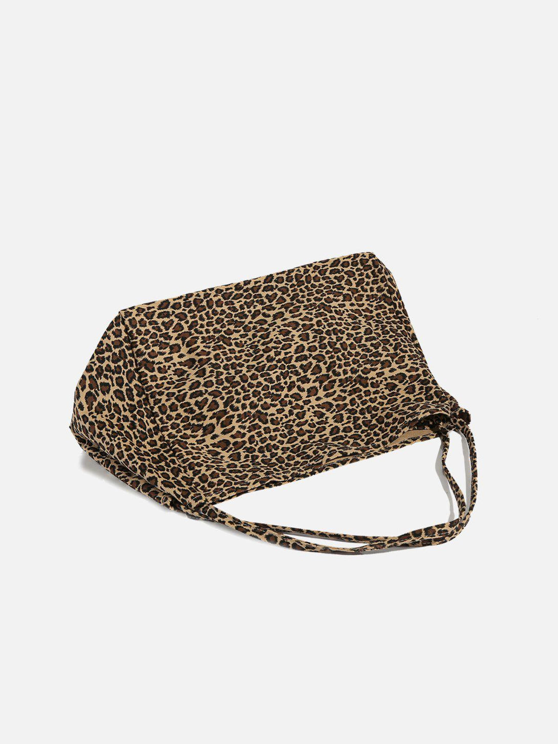 TALISHKO leopard print tote bag showcasing its bold pattern and spacious design.