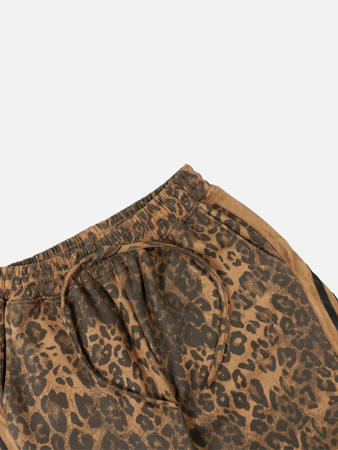 TALISHKO sweatpants with leopard pattern, showcasing detailed texture and stylish design.