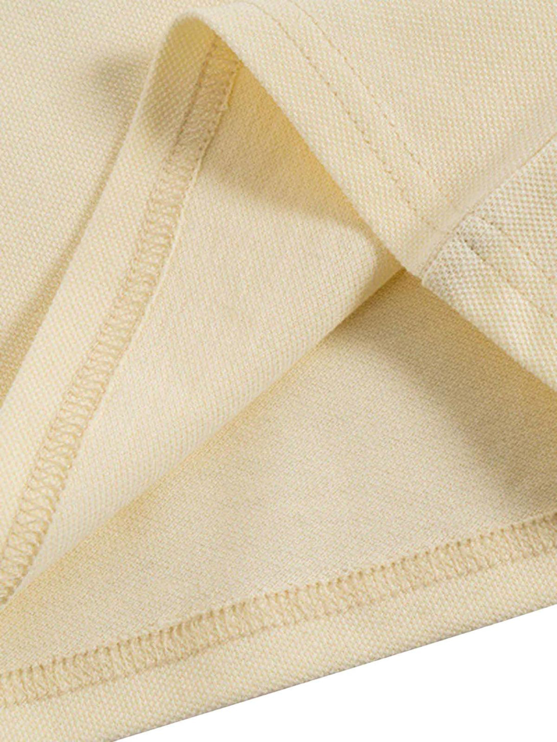 Detailed fabric and stitching of a TALISHKO polo shirt, showcasing quality craftsmanship.
