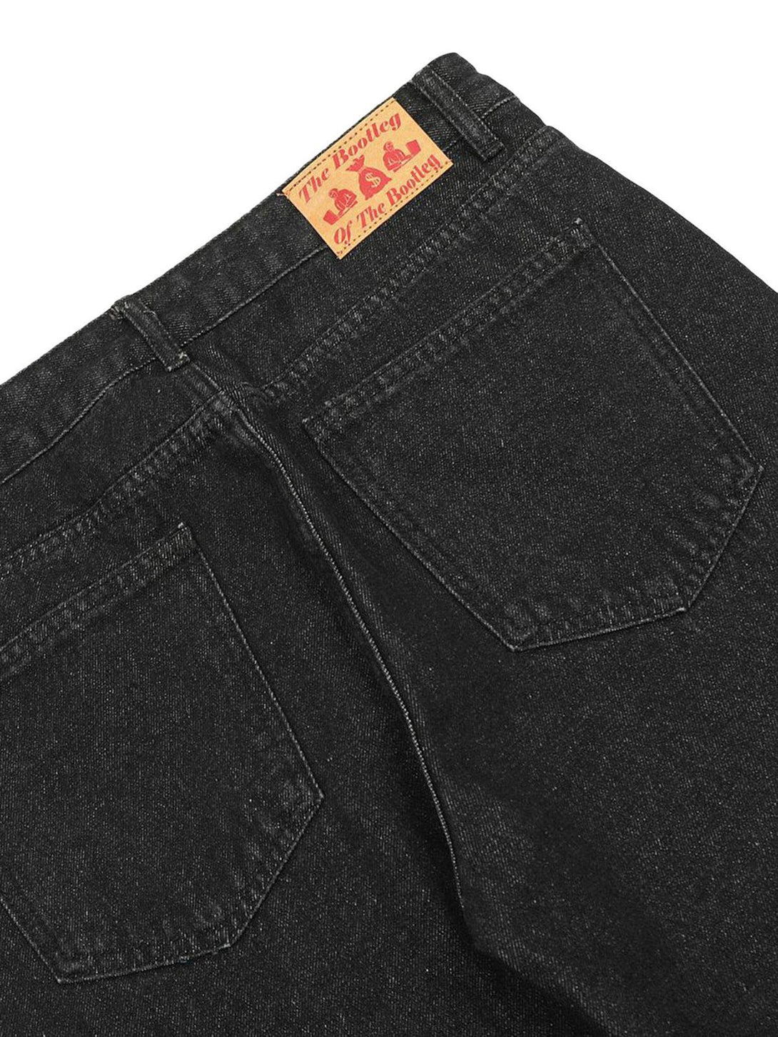 Back view of TALISHKO hip-hop washed jeans, highlighting pocket design and unique label.