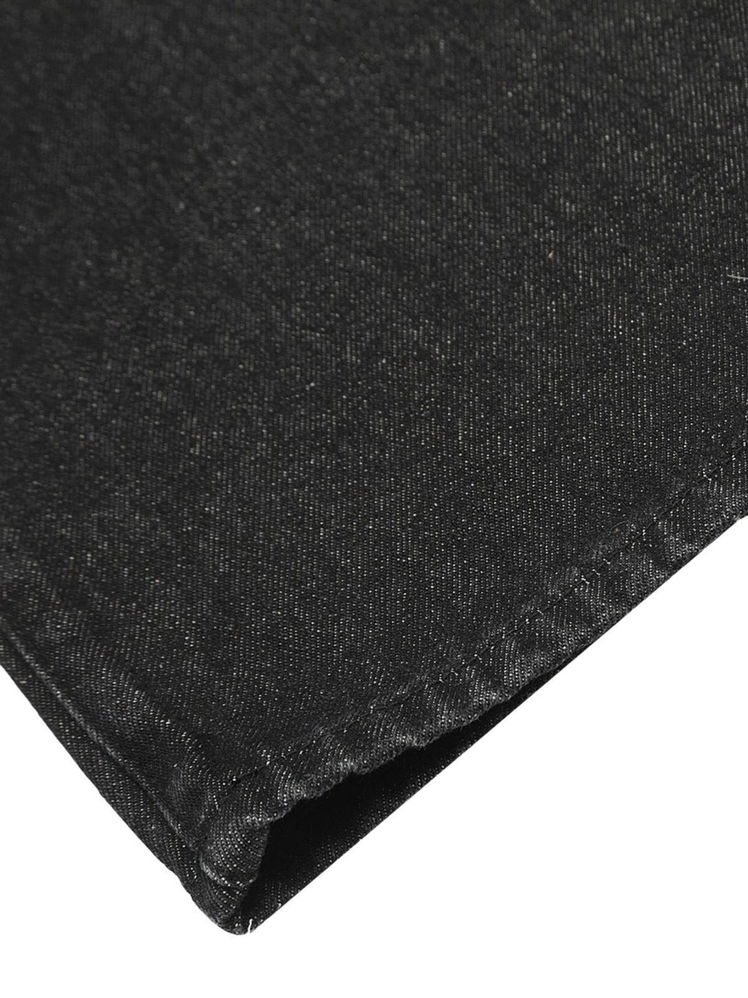 "Close-up of TALISHKO hip-hop jeans showcasing detailed stitching and textured fabric."