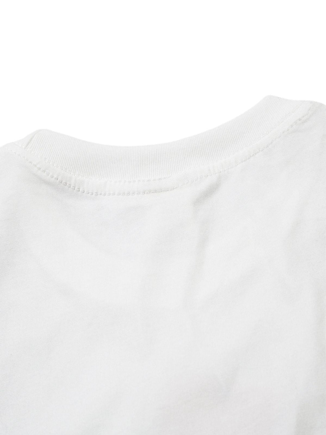Detailed view of the neckline on a white tank top by TALISHKO, highlighting fine stitching.