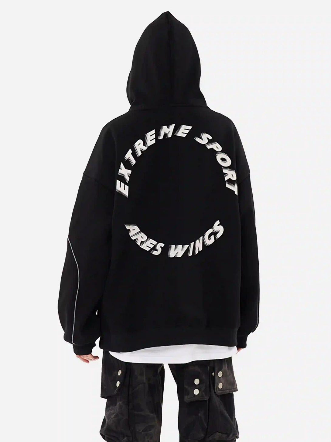 Back view of TALISHKO black hoodie with bold letter print and line design, paired with cargo pants.