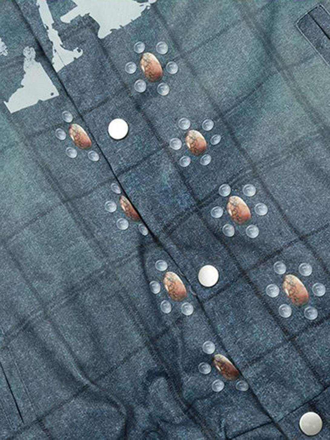 Intricate look at TALISHKO's quilted bomber jacket, featuring unique button details and texture.