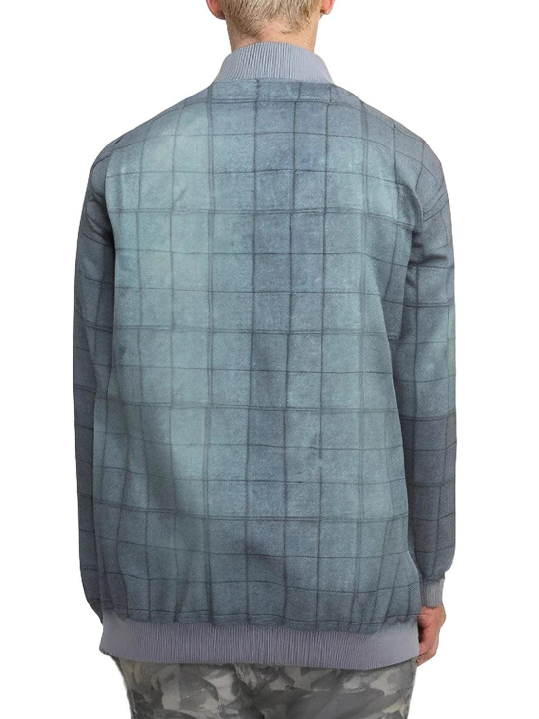 Back view of TALISHKO's quilted bomber jacket, highlighting the blue check pattern and texture.