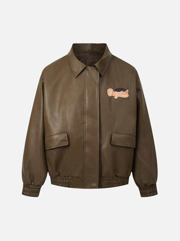 TALISHKO bomber jacket in leather with embroidered lettering on the front, showcasing a sleek design.