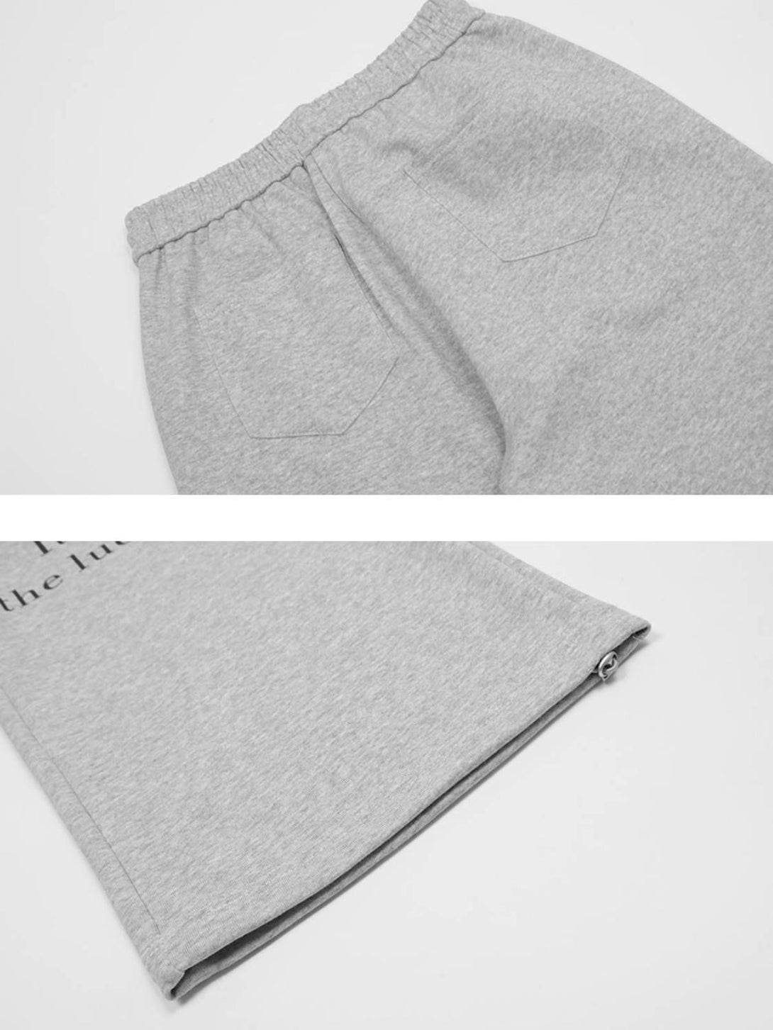 Detailed view of gray TALISHKO sweatpants, highlighting back pockets and hem design.