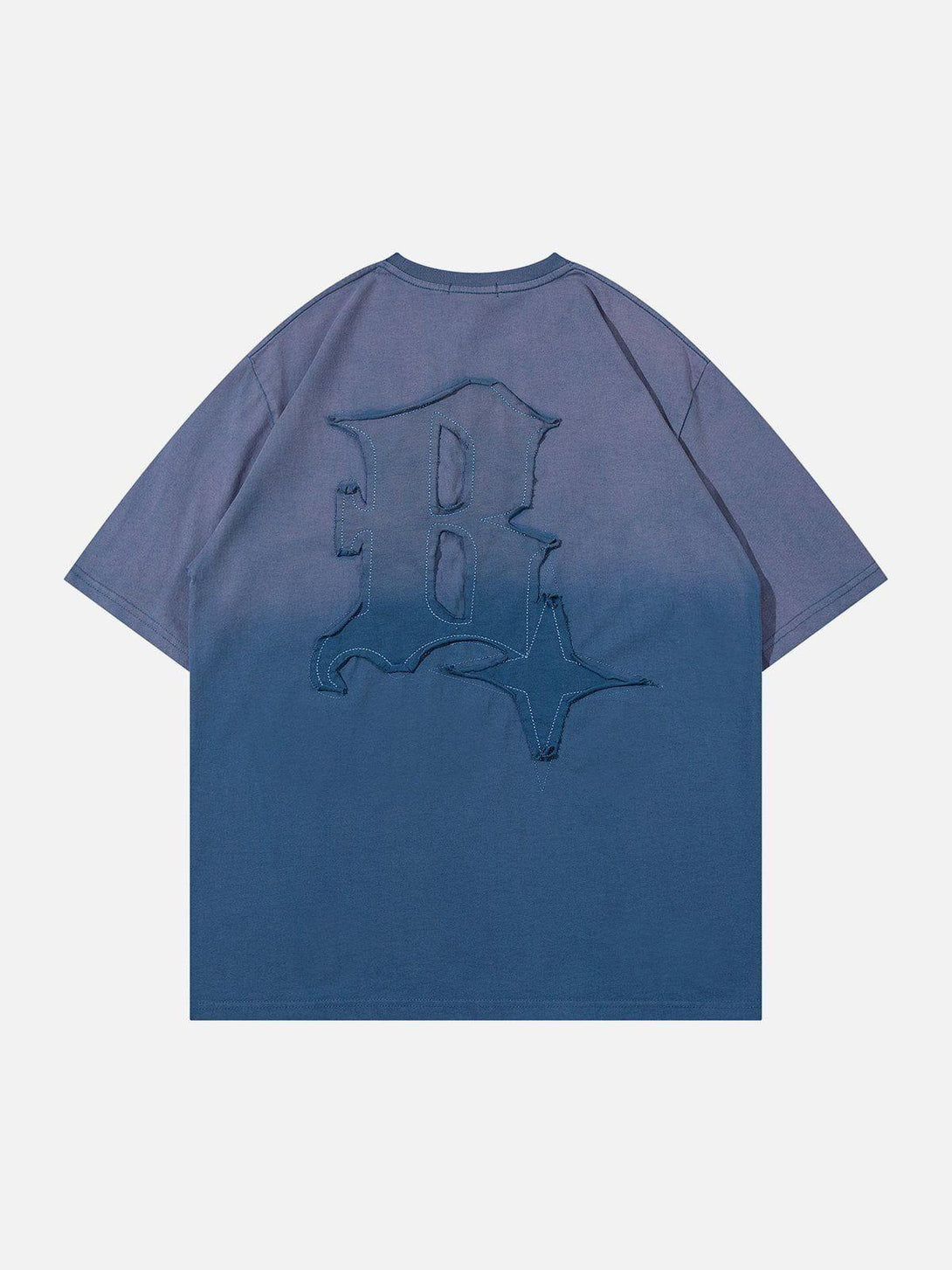 Back view of a blue TALISHKO vintage tee with bold letter graphics and relaxed fit.