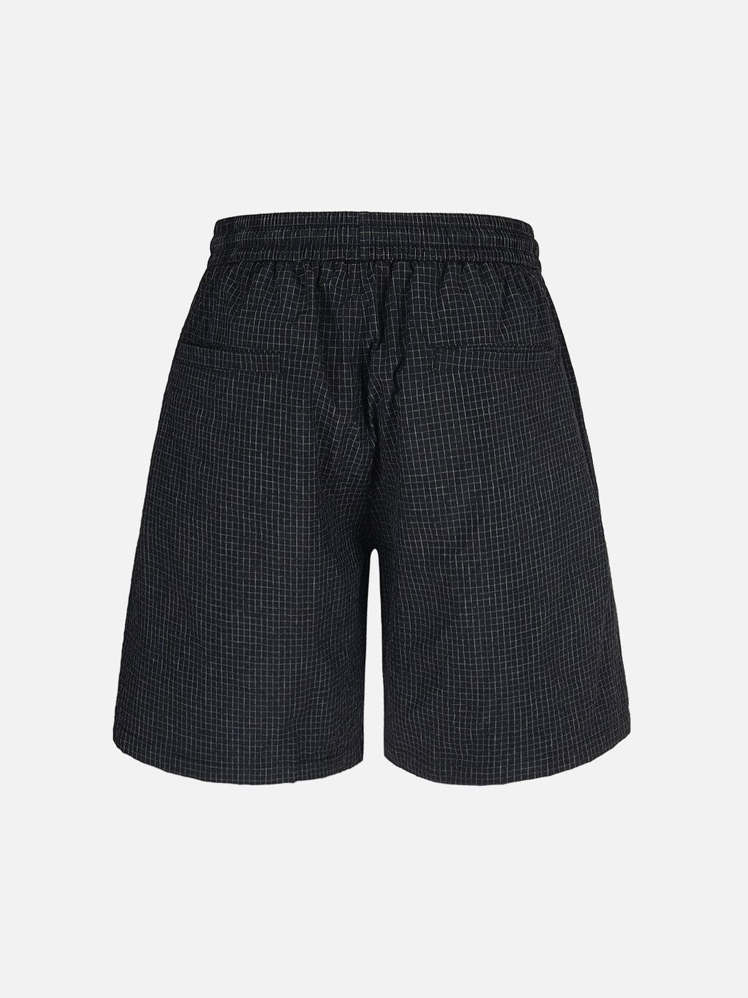 Rear view of black TALISHKO quick-dry cargo shorts, showcasing a subtle checkered design.
