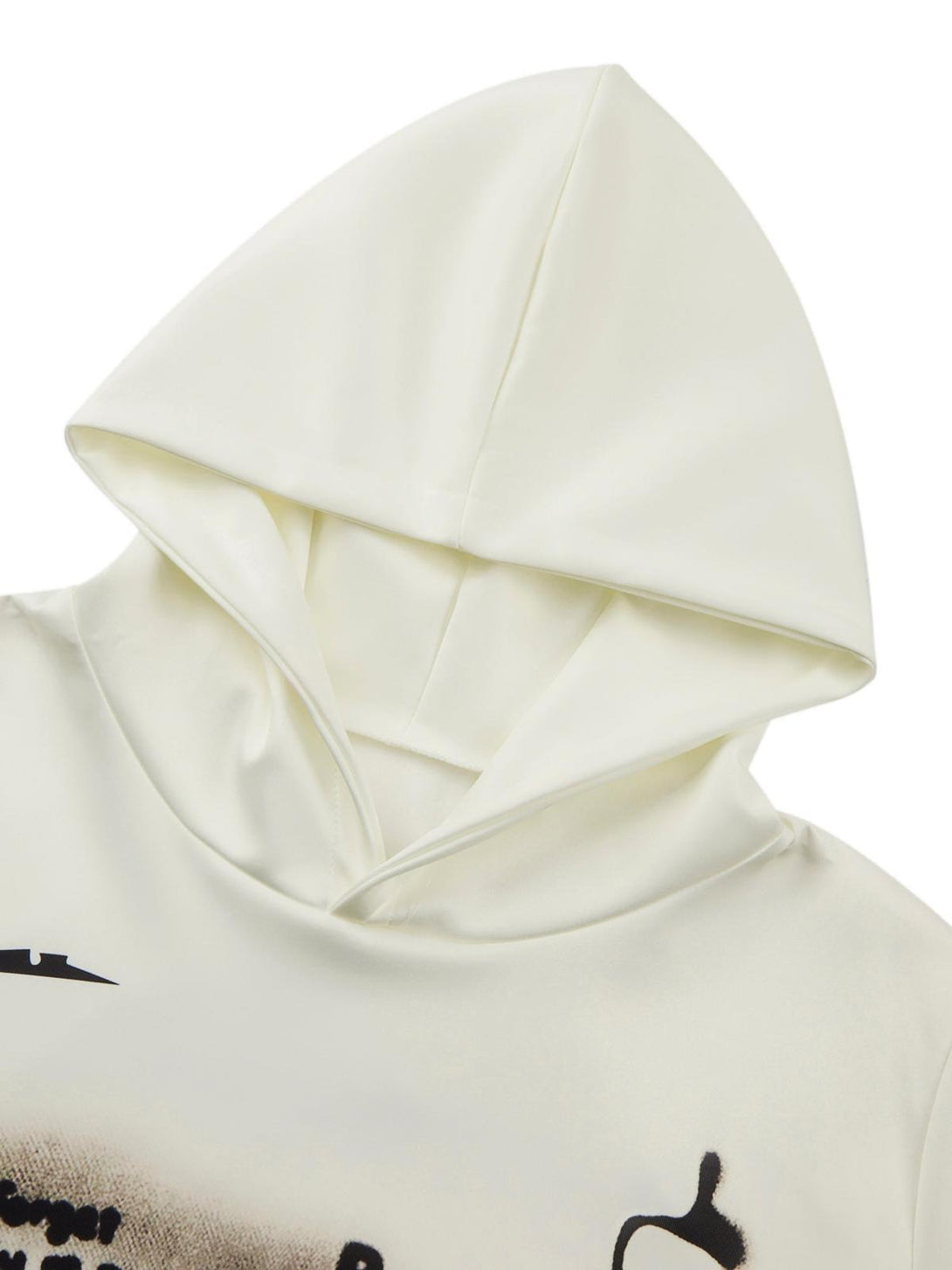 A detailed view of the hood on the TALISHKO character hoodie, showcasing its smooth fabric.