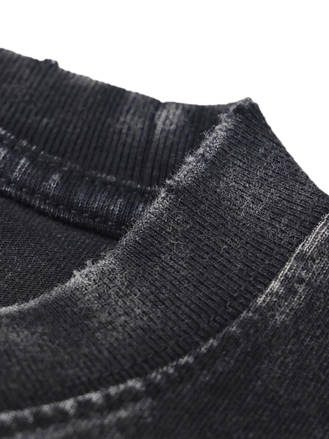A detailed view of the ribbed neckline on a washed T-shirt by TALISHKO, highlighting texture.