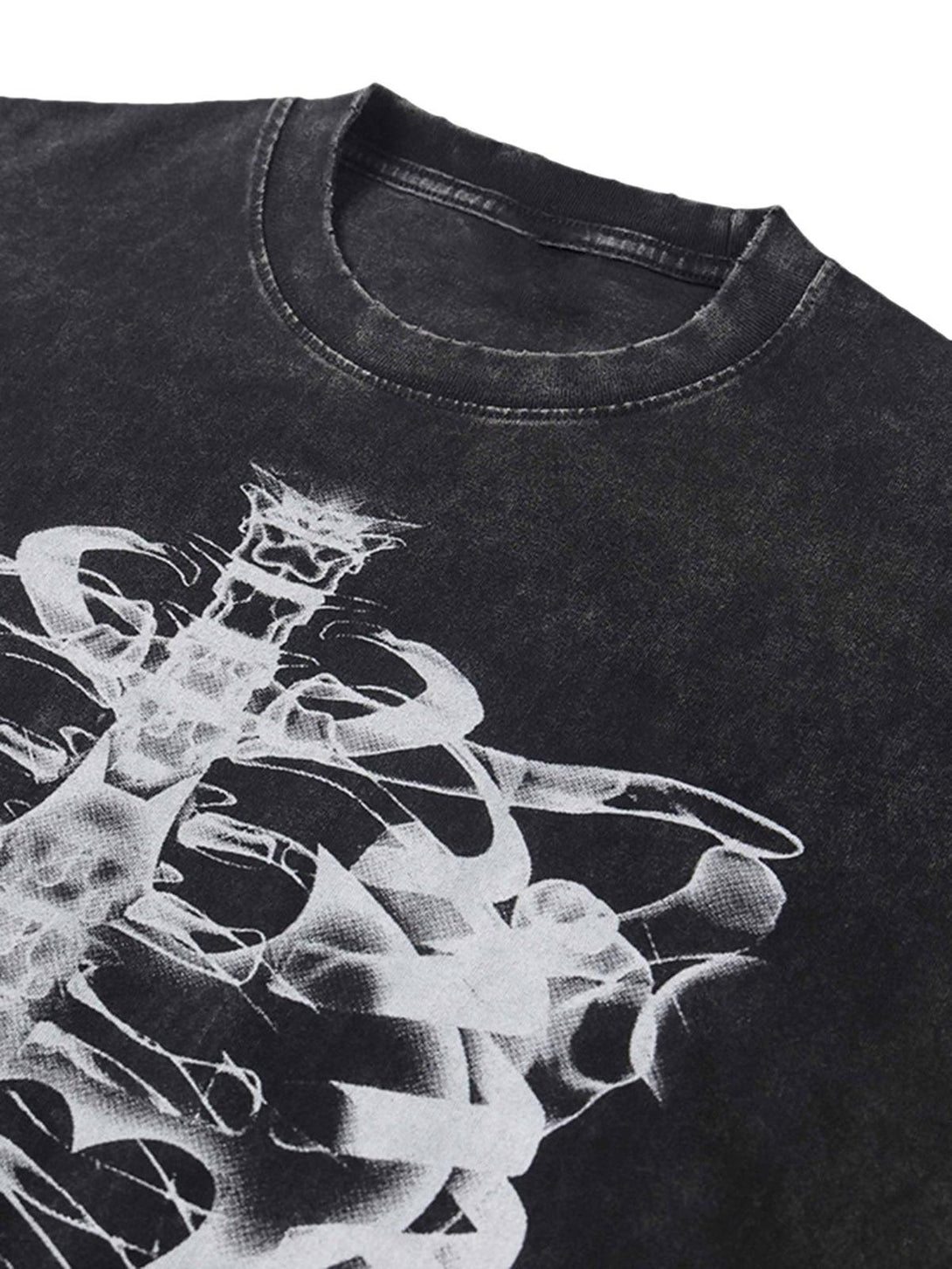A tight crop highlighting the ribcage design on TALISHKO's washed T-shirt, capturing retro vibes.