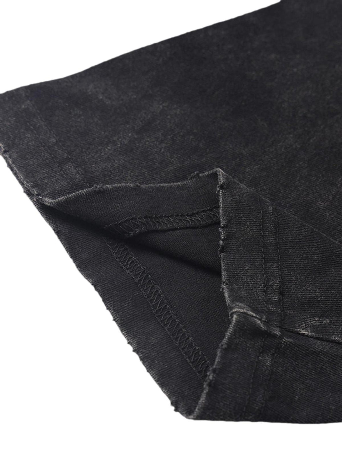 Intricate stitching detail on TALISHKO's washed T-shirt, showcasing quality craftsmanship.