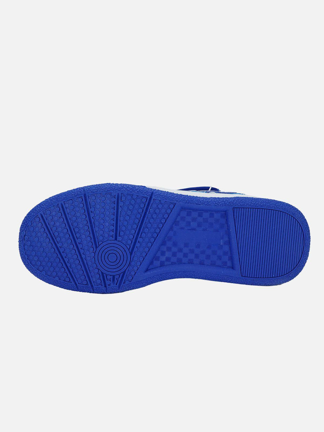A detailed look at the blue sole of TALISHKO skate shoes, highlighting its unique pattern.