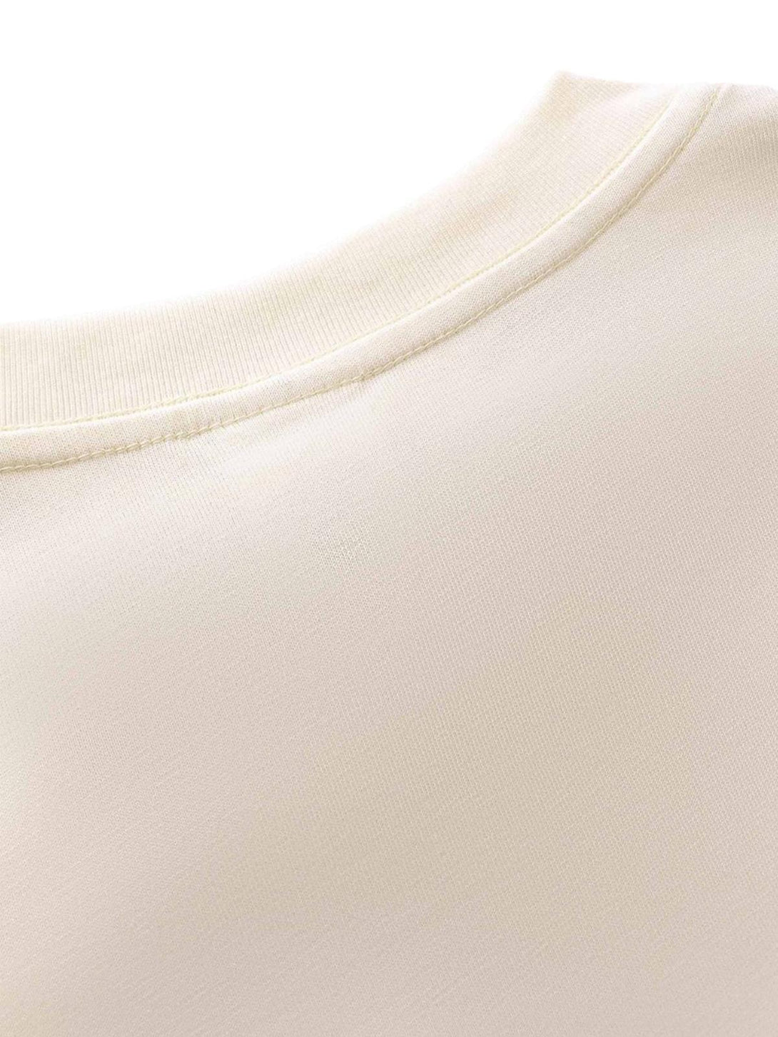 Detailed fabric and stitching of TALISHKO T-shirt, showcasing a smooth, high-quality texture.