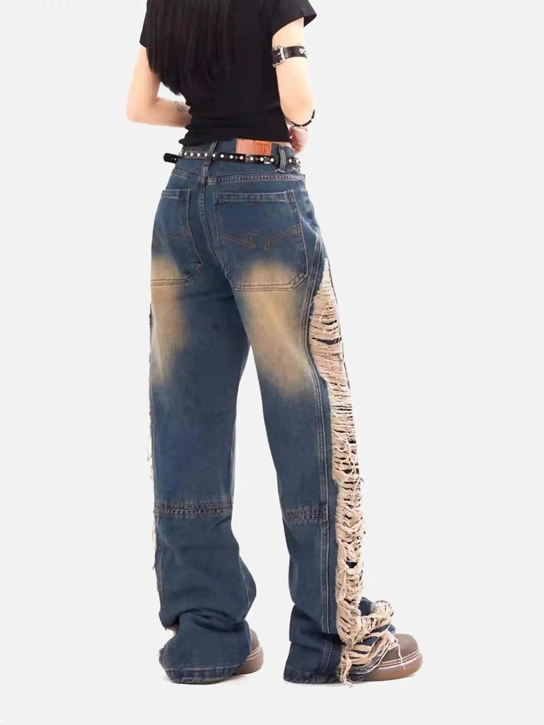 Back view of TALISHKO Maillard Hottie Ripped Jeans, featuring unique side fraying.