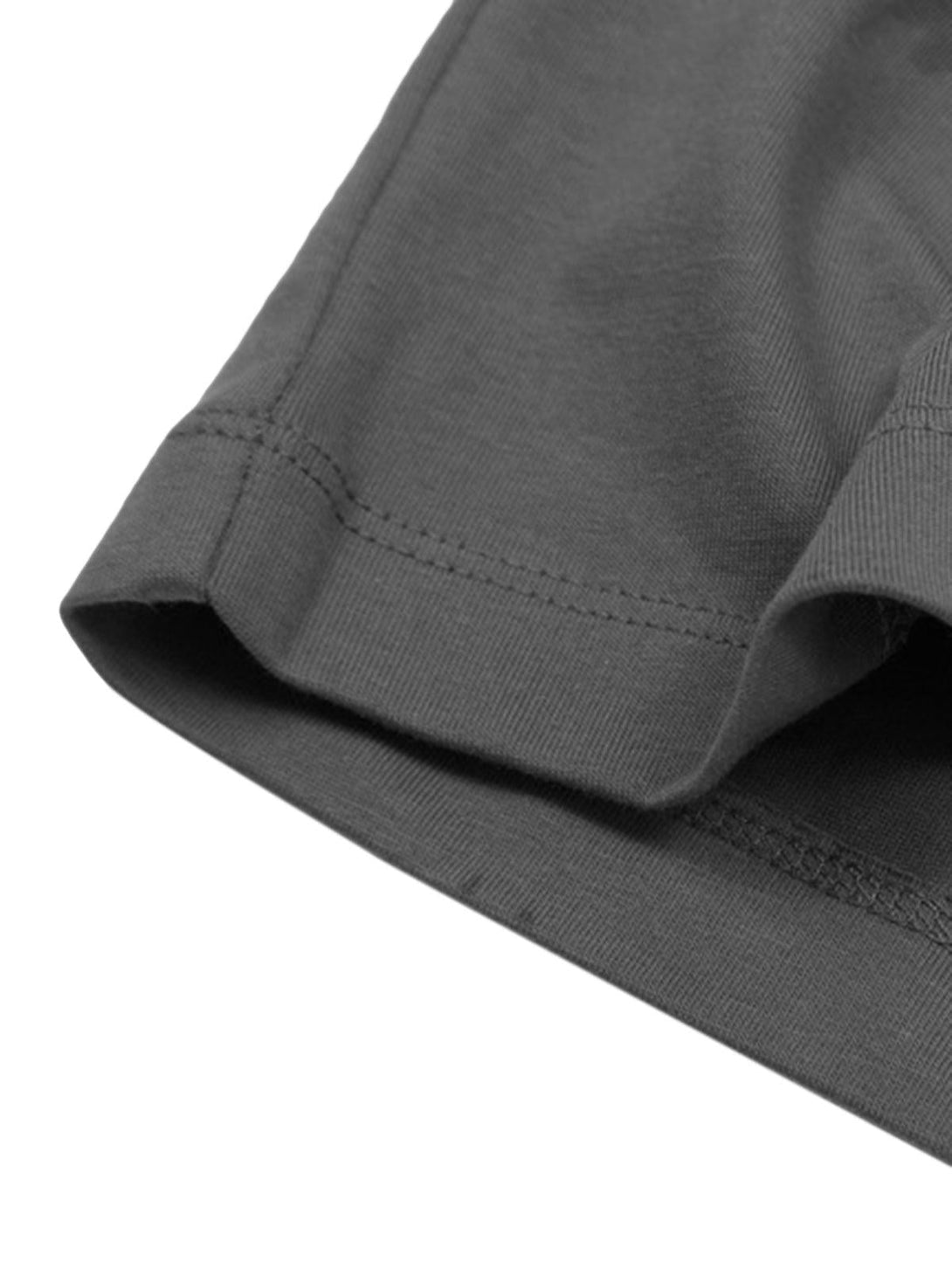 Detailed fabric and stitching of TALISHKO's graphic T-shirt, highlighting quality craftsmanship.