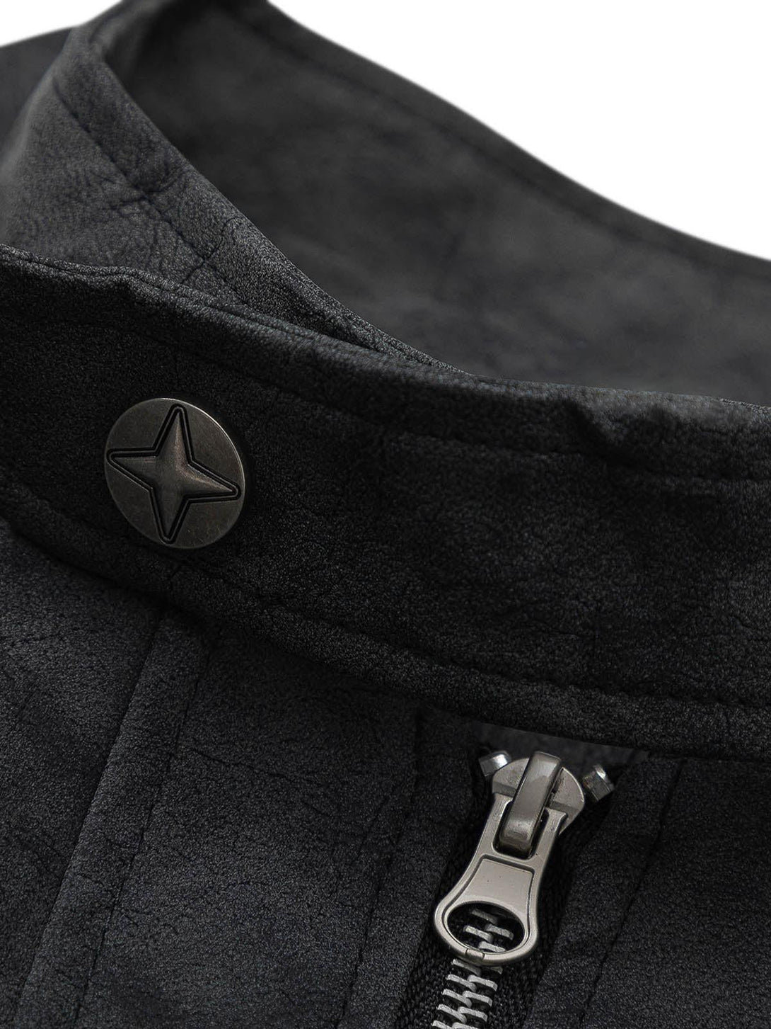Intricate look at the star-button detail on a matte PU moto leather jacket by TALISHKO.