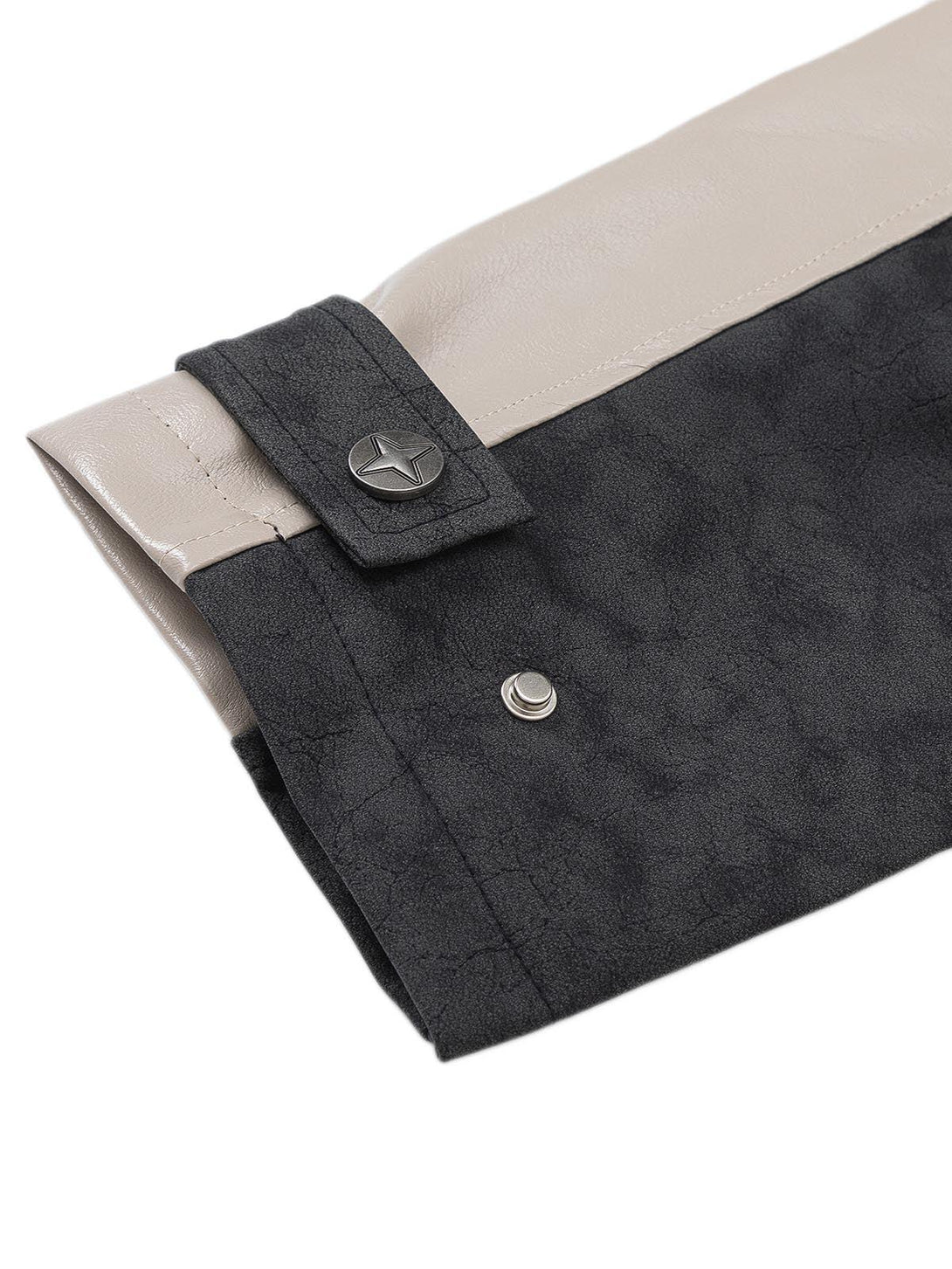 Detailed view of star-button and fabric texture on a TALISHKO matte PU moto leather jacket.