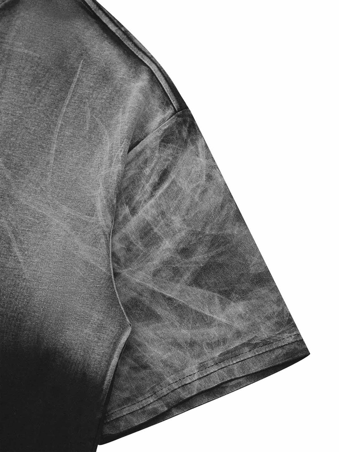 A detailed view of TALISHKO's street rap T-shirt, showcasing its unique faded texture and style.