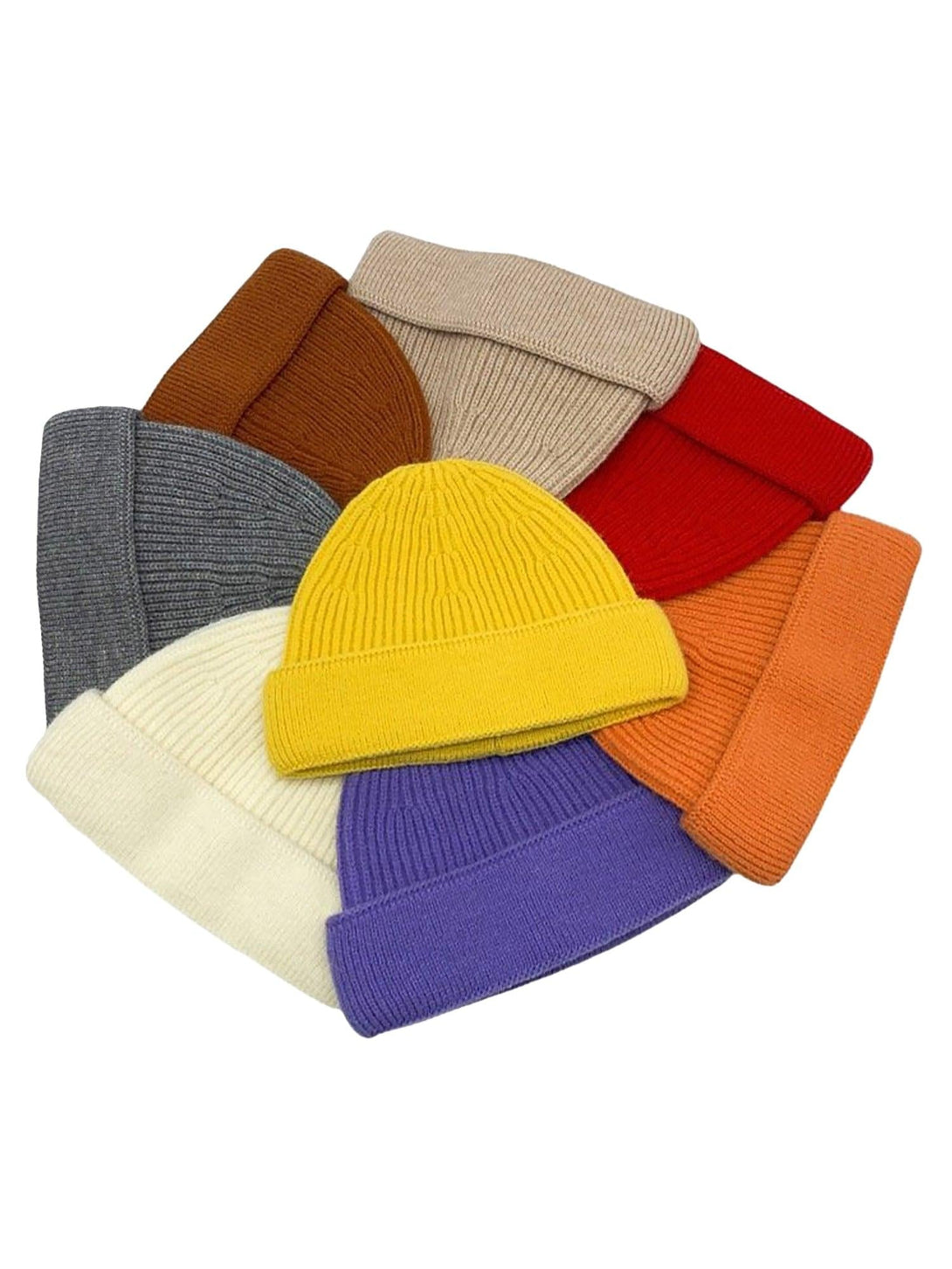 Colorful assortment of TALISHKO mini fisherman beanies, highlighting cozy knit textures.