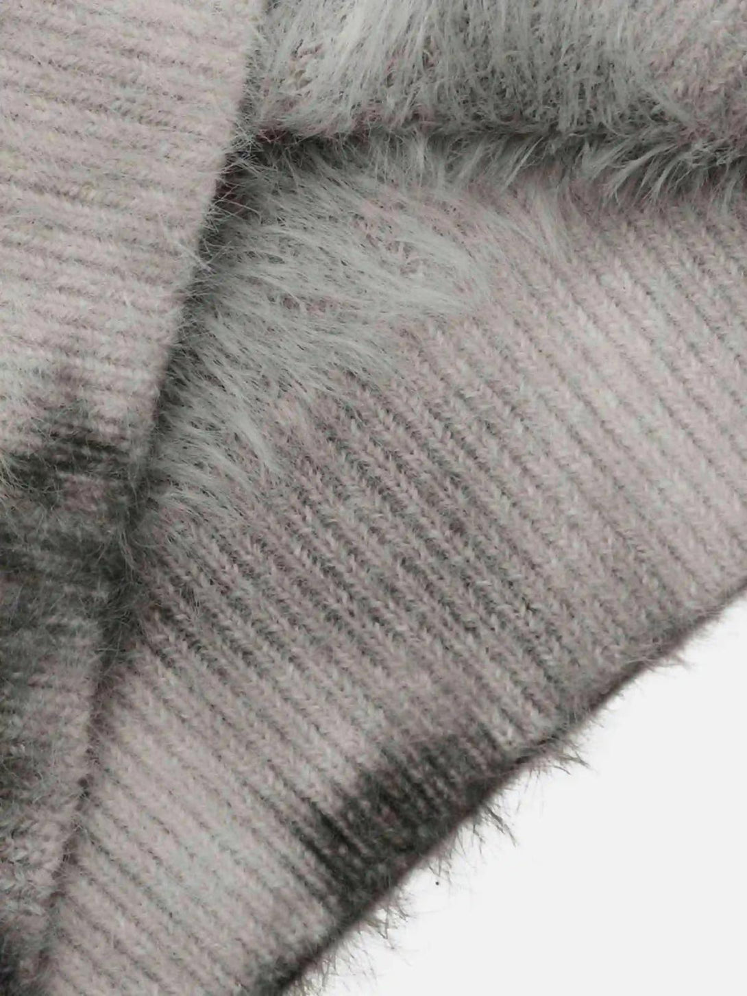 A detailed view of TALISHKO's mohair sweater texture, showcasing its soft tie-dye design.