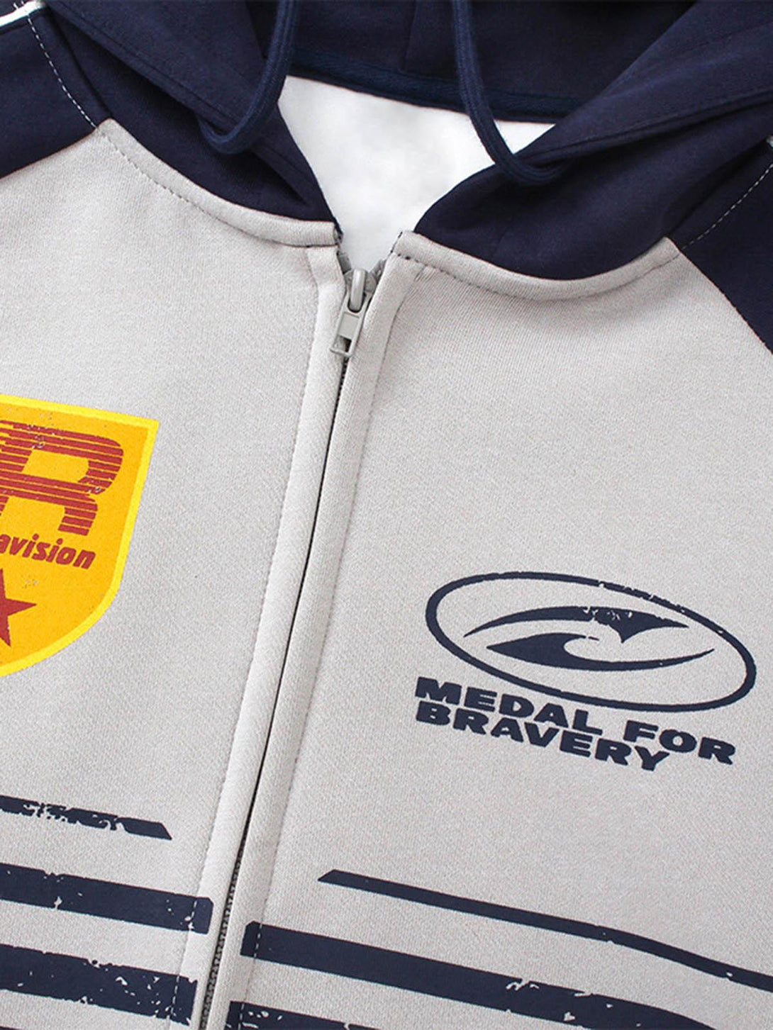 A tight crop highlighting the printed design on a TALISHKO motorcycle-style hooded sweatshirt.