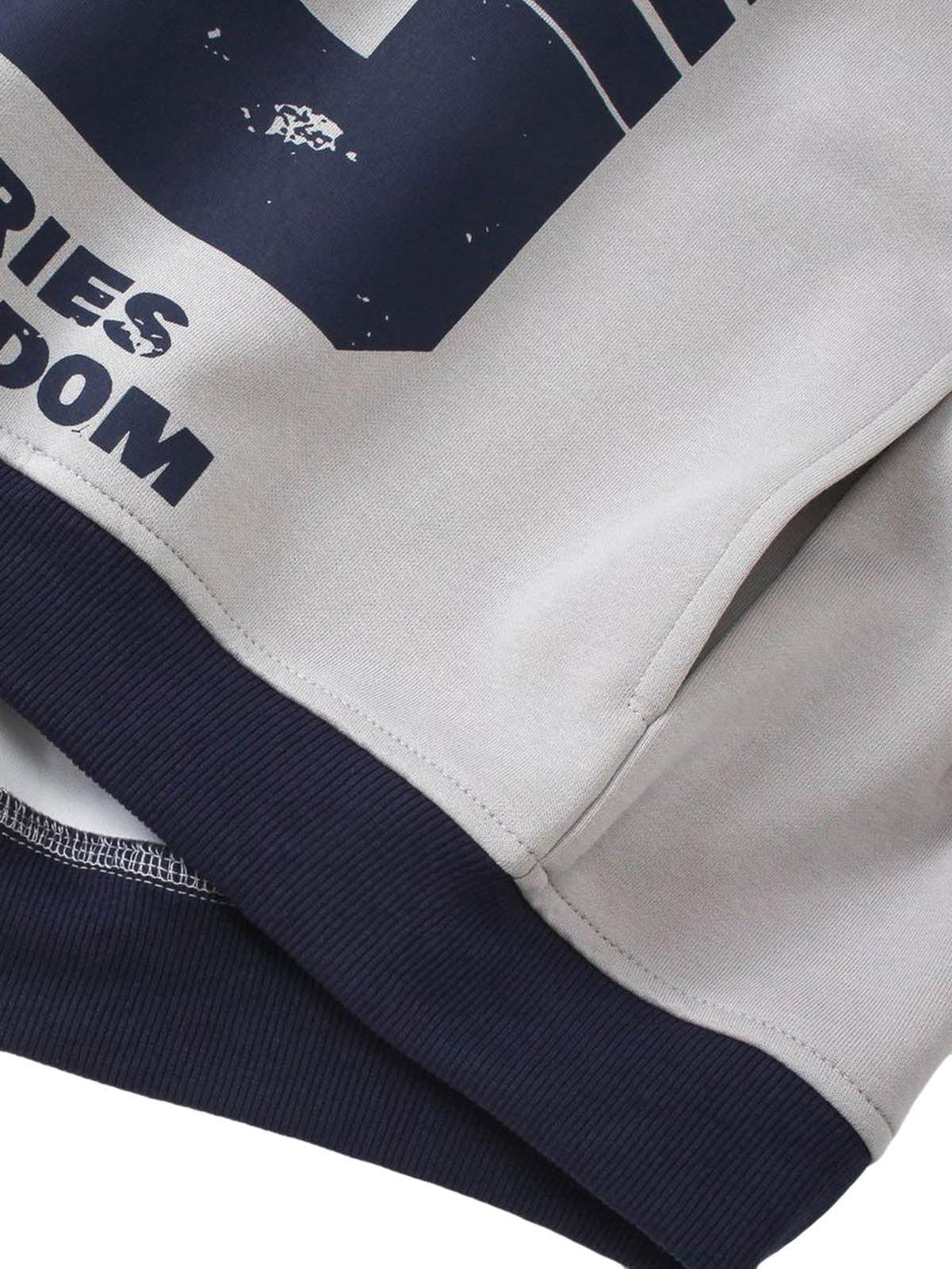 Detailed fabric and stitching of a motorcycle-style printed sweatshirt by TALISHKO.