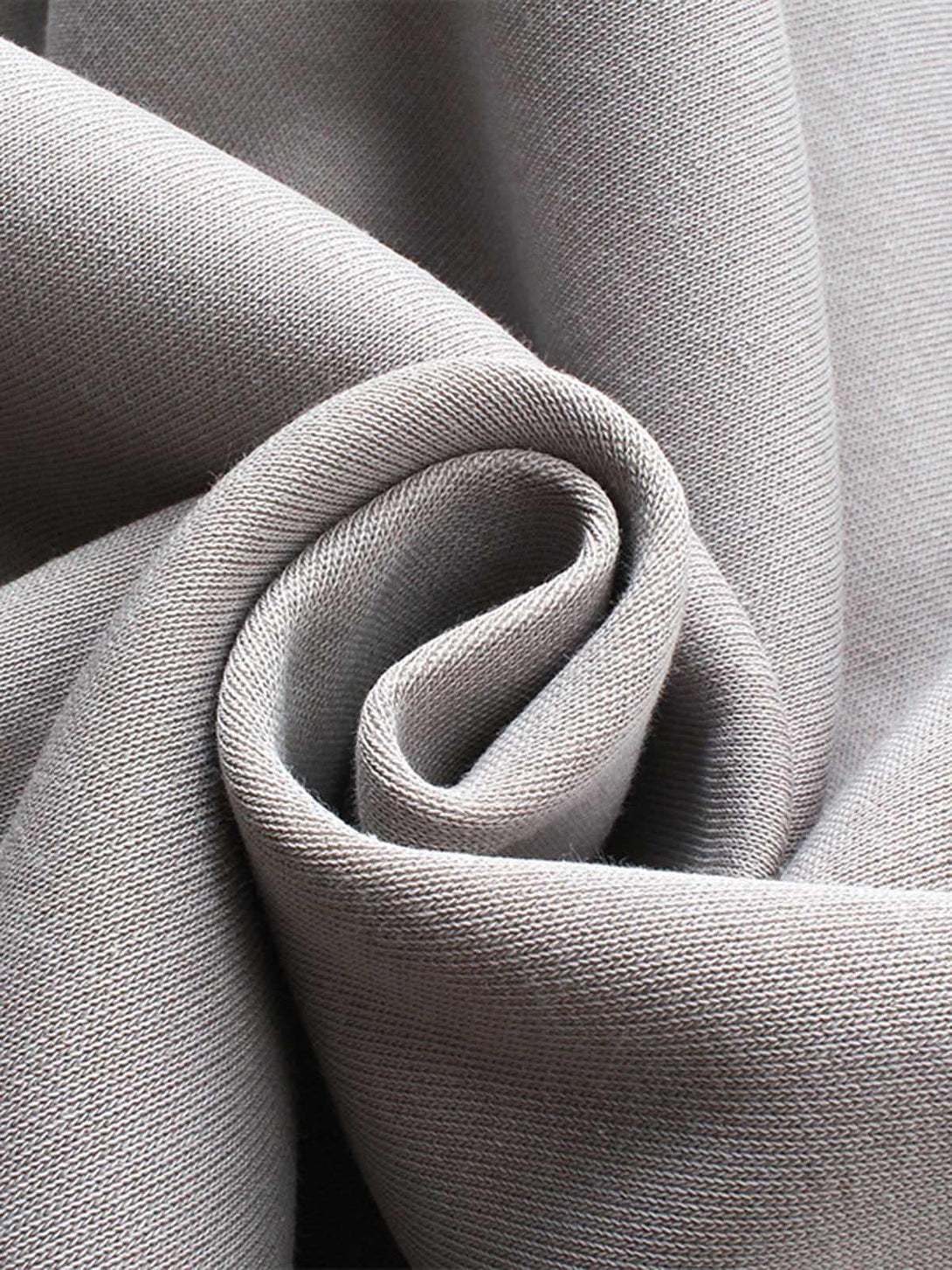 Zoomed-in texture of a motorcycle-style hooded sweatshirt fabric by TALISHKO.