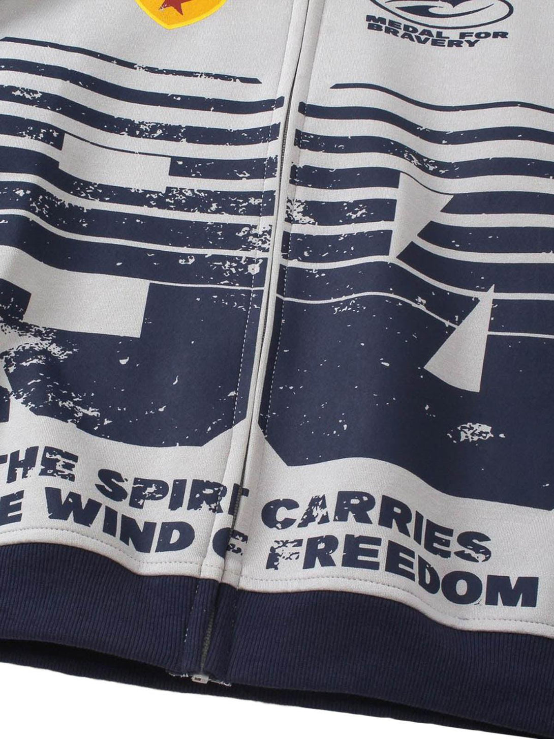 A close-up of the bold, graphic design on a TALISHKO motorcycle-style hooded sweatshirt.