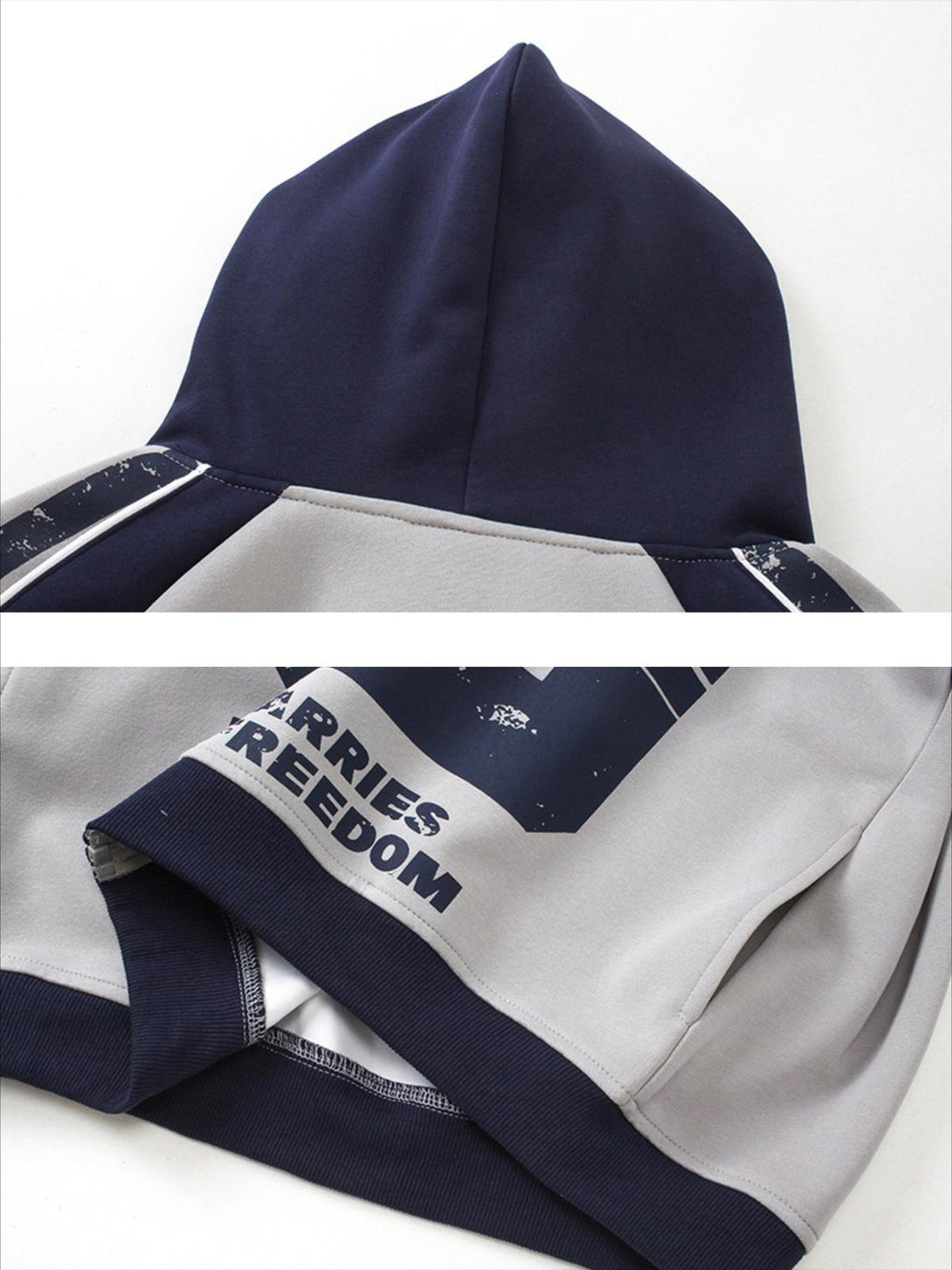 A detailed view of the TALISHKO hoodie showcasing mottled distressed prints and text accents.