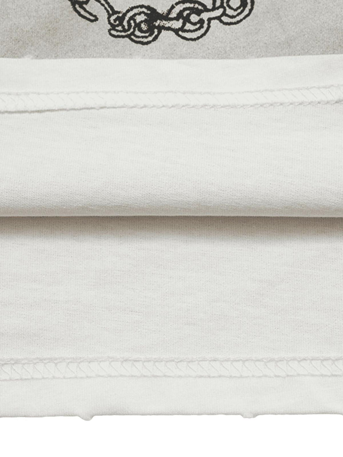 Detailed fabric and stitching on a street rap T-shirt by TALISHKO, featuring chain motifs.