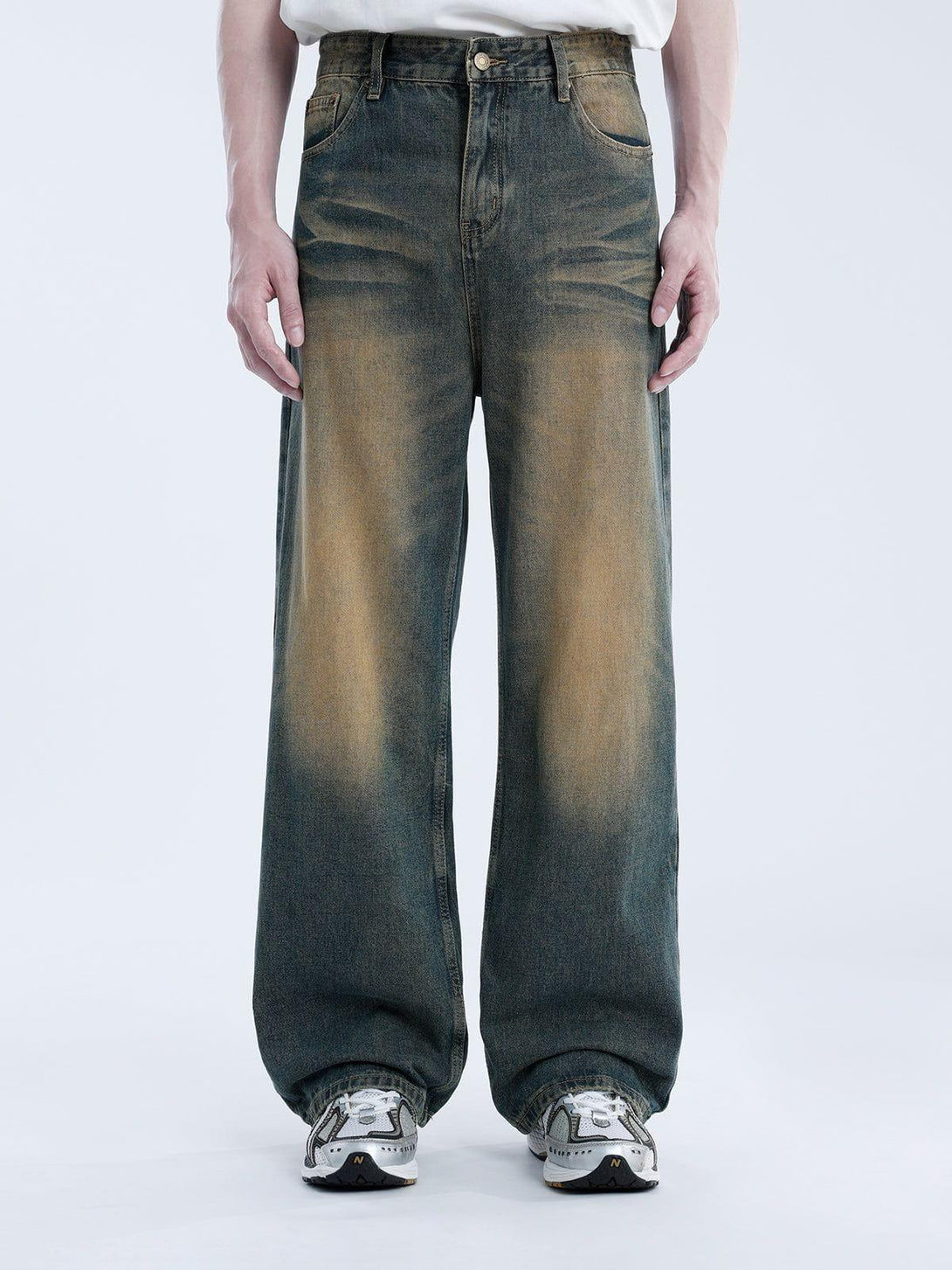 Wide-leg Mud Dyeing Washed Jeans by TALISHKO, showcasing a relaxed fit with a faded effect.