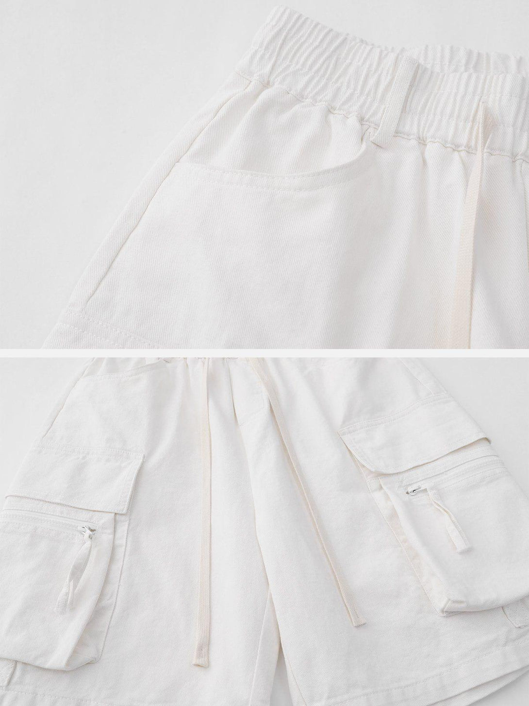 Detailed view of white cargo shorts by TALISHKO, showcasing pockets and drawstring design.