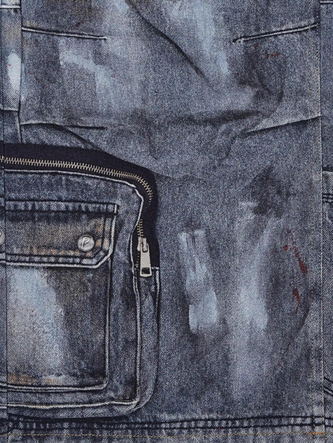 Texture and pattern showcased in TALISHKO's multi-pocket overalls jeans with distressed details.