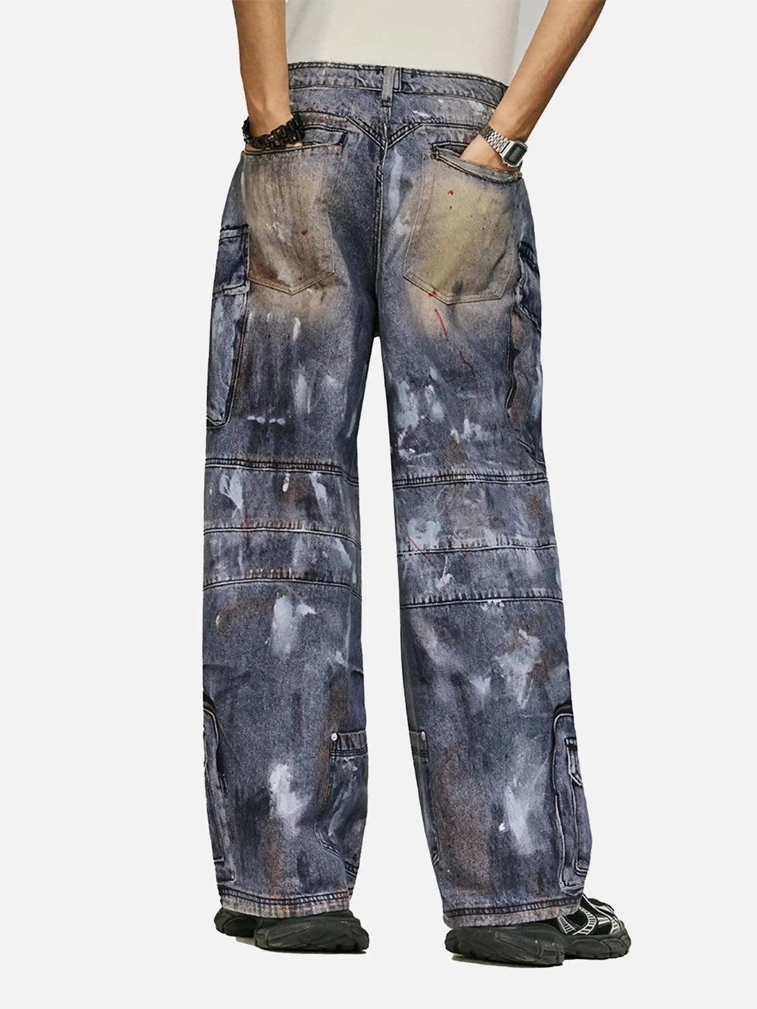 Back view of TALISHKO multi-pocket jeans with unique distressed detailing and relaxed fit.