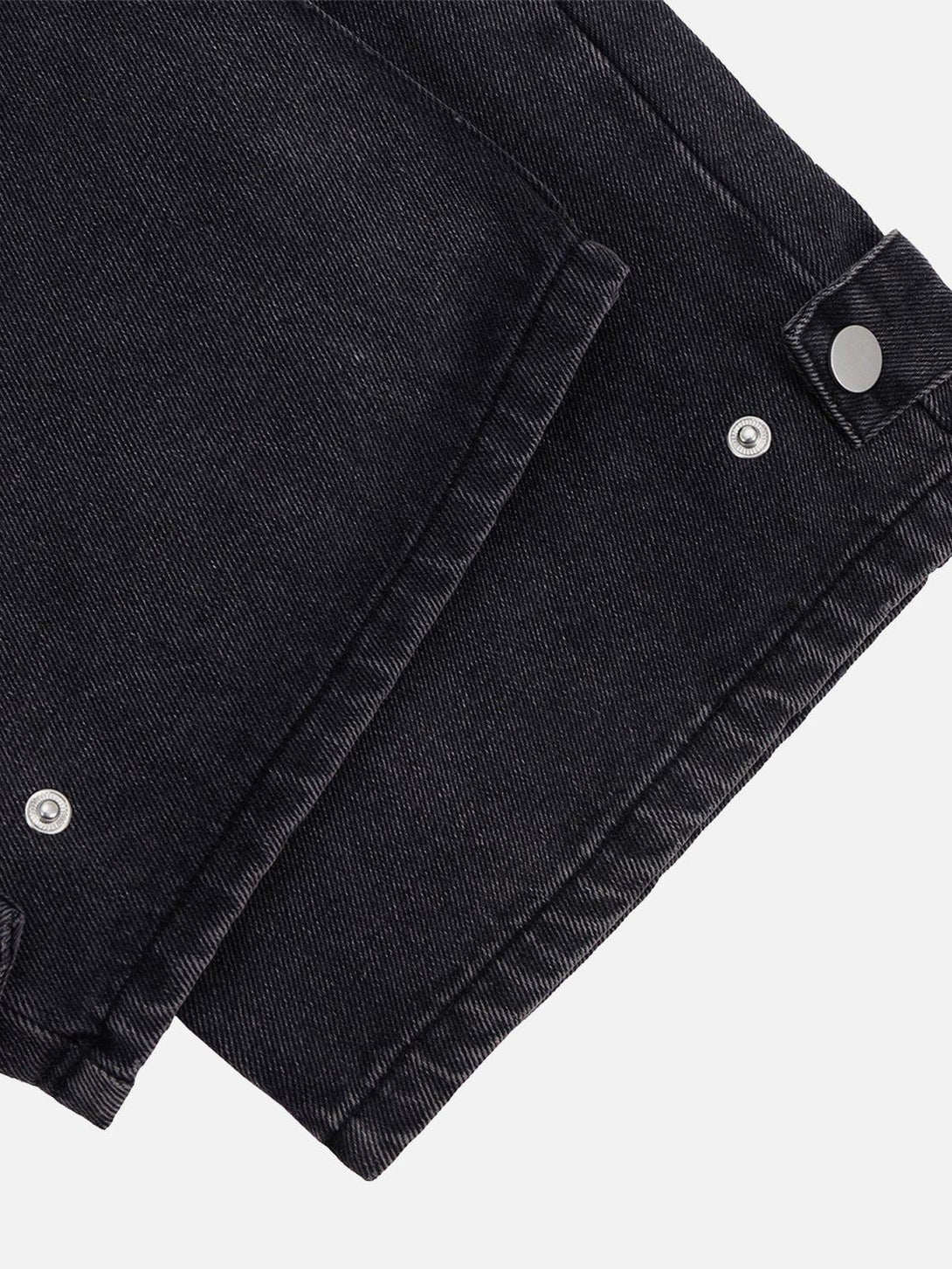 Detailed fabric and stitching of black wide-leg jeans by TALISHKO, highlighting pockets.