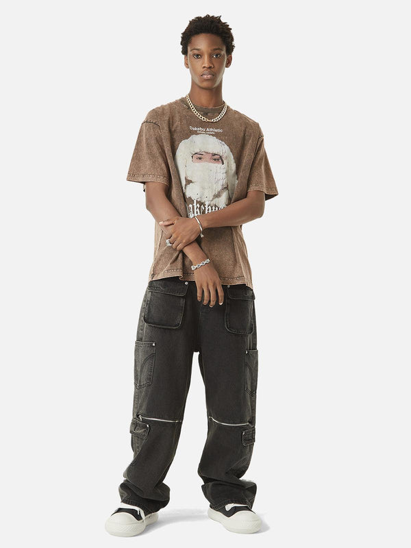 Model wearing TALISHKO multi-pocket hip-hop jeans with a graphic tee and sneakers.