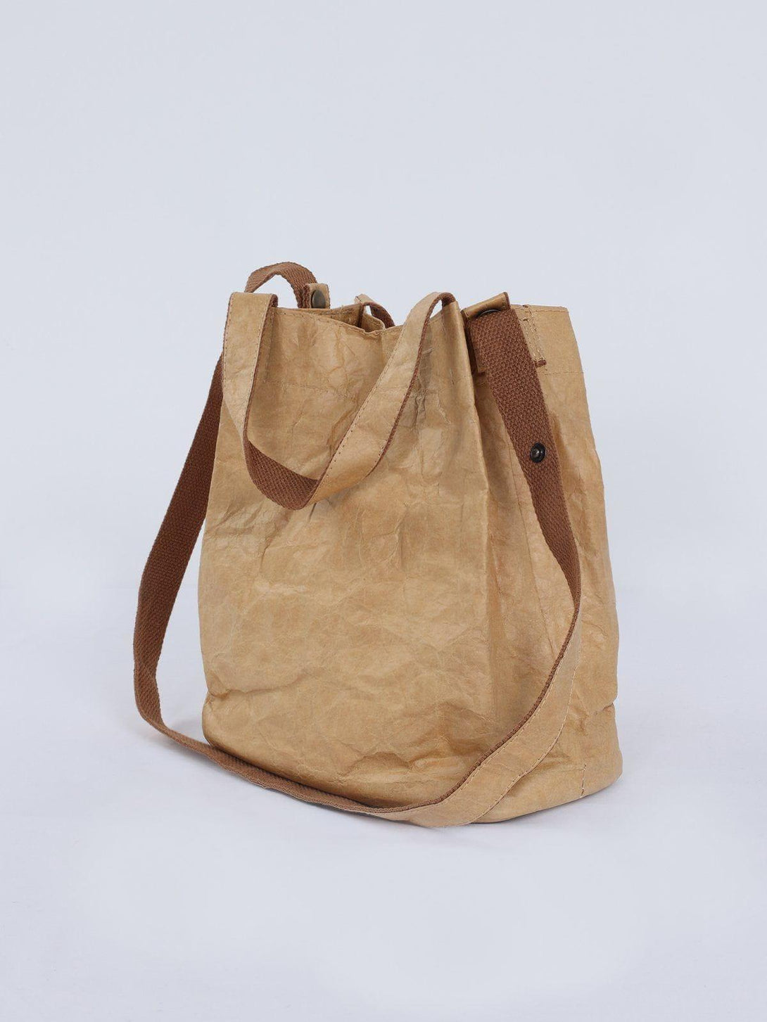 TALISHKO's natural wrinkle waterproof kraft paper bag features a unique texture and brown straps.