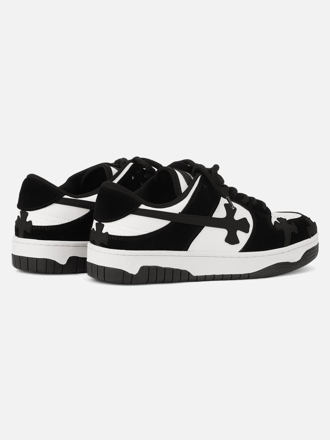 Rear angle of TALISHKO Niche Board Casual Shoes in black and white, emphasizing the bold design.
