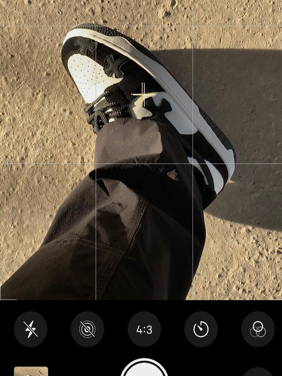 Overhead shot of TALISHKO Niche Board Casual Shoes in black and white, capturing casual street style.