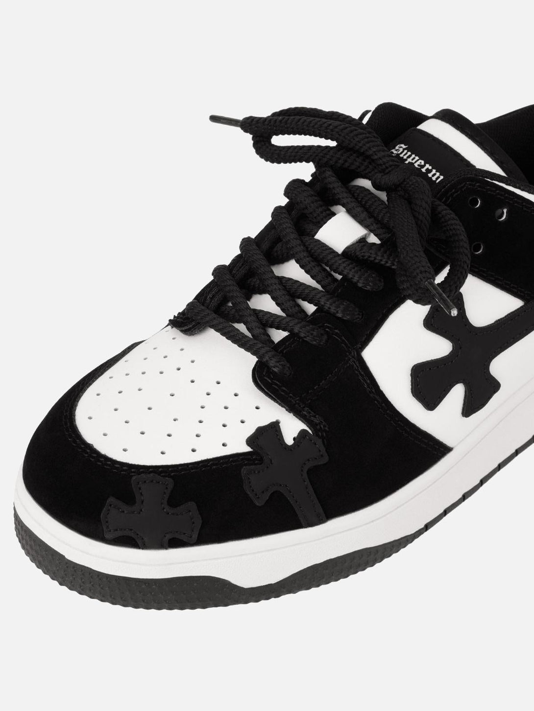 Close-up of TALISHKO's Niche Board Casual Shoes, highlighting black and white detailing.
